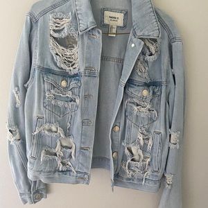 Jean jacket with rips